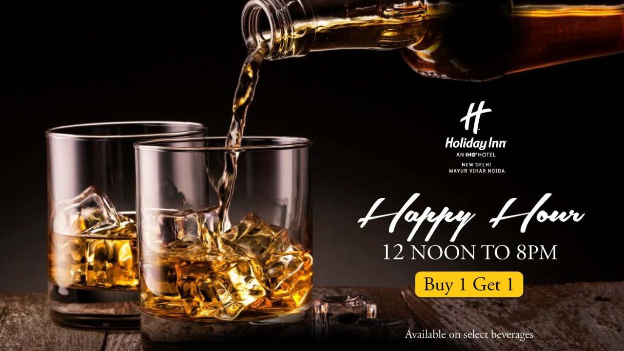 Holiday Inn New Delhi Mayur Vihar Noida By Ihg Nova Deli Exterior foto A poster advertising a happy hour