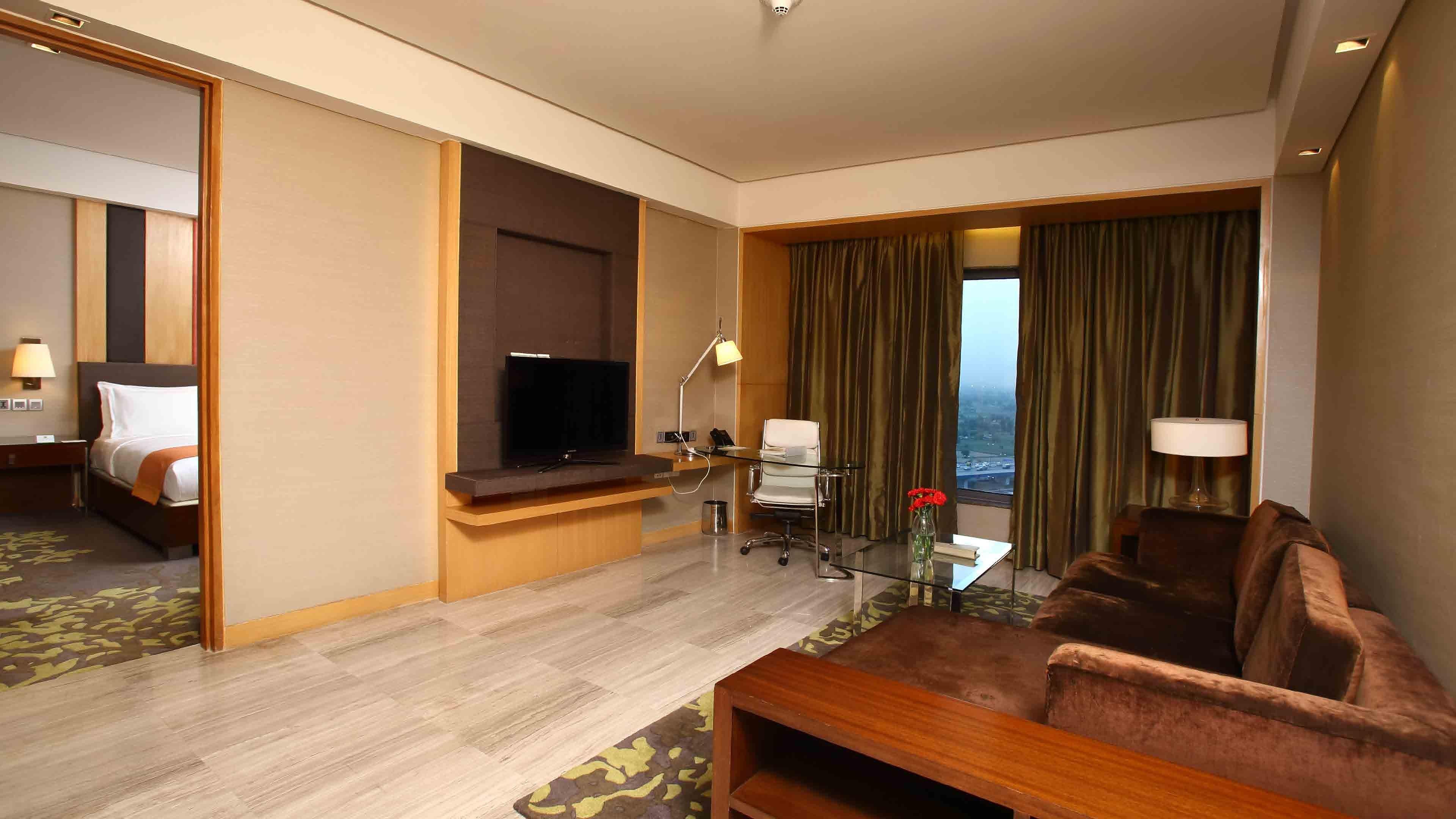 Holiday Inn New Delhi Mayur Vihar Noida By Ihg Nova Deli Exterior foto Suite at the Taj Bengal